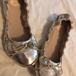 Juicy couture ballet flats. Gold. Never worn.